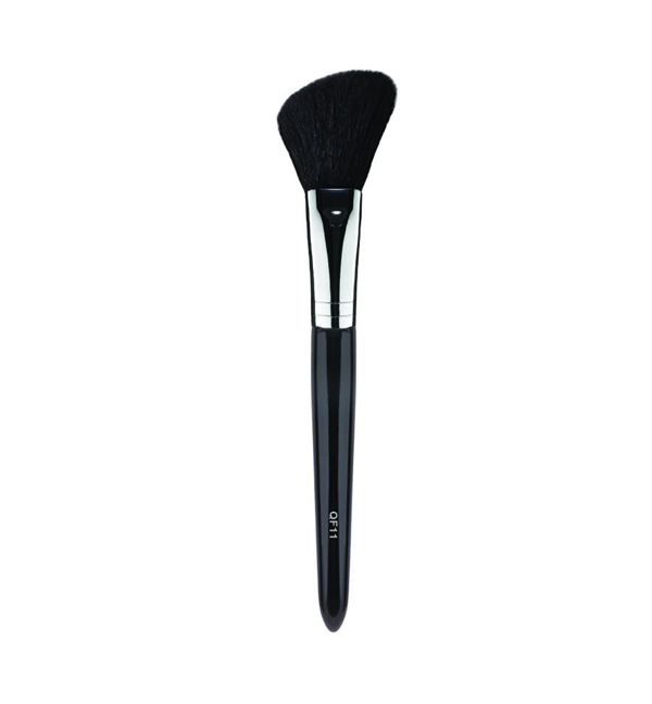 This QF11 angled blush brush was designed to be an effective too to apply blush and contour. Use the fluffy and full side of this brush to apply blush onto the apples of the cheeks and the angled side to apply and blend contour into the hallows of the cheeks, on the jawline, and around the perimeter of the hair line.